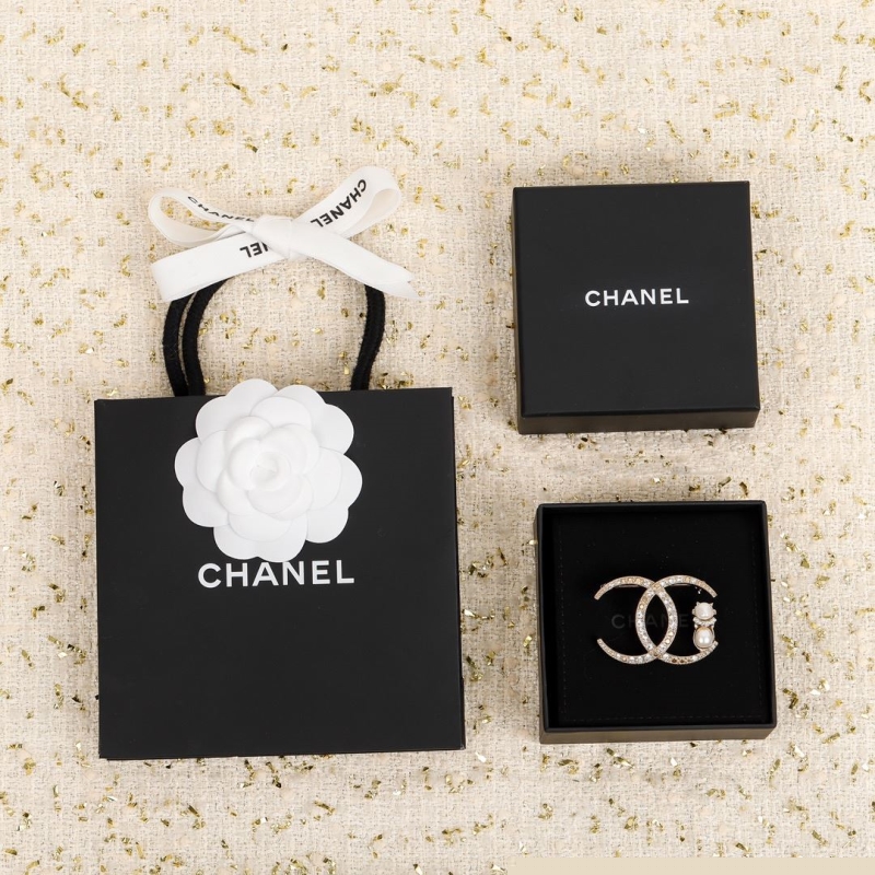 Ch*el brooches